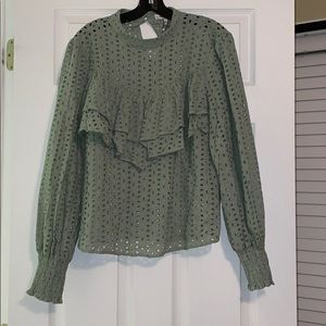 Green smocked top with cut detail